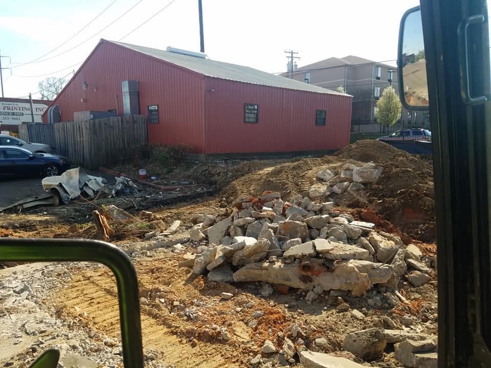 Concrete debris cleared during a commercial site preparation project